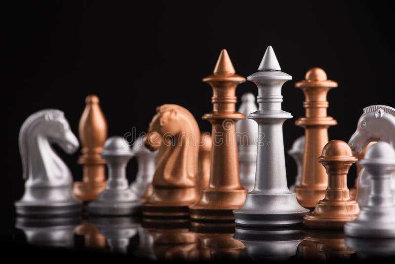 Gold Chess Pieces on Black Surface · Free Stock Photo