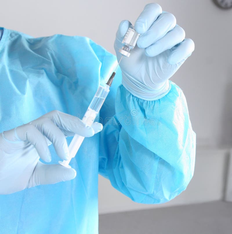 Seringa, injeção médica à disposição, palma ou dedos Equipamento plástico da vacinação da medicina com agulha Doutor da enfermeir