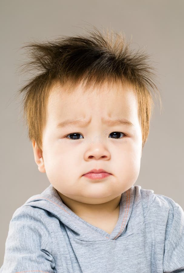 Serious baby stock image. Image of emotion, asian, people 40942927