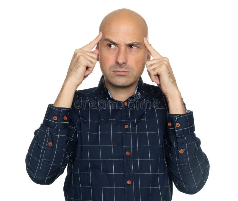Serious bald man thinking about a problem stock photo Serious bald man thinking about a problem stock photo