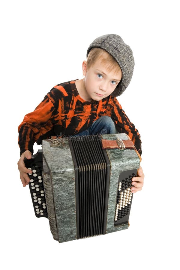 Serious boy with accordion