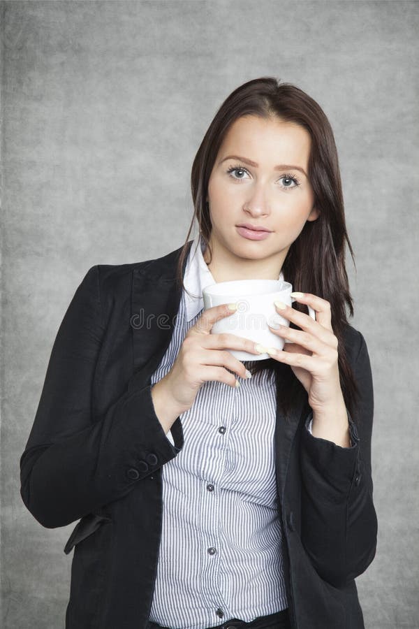 Businesswoman Drinking Hot Coffee To Warm Up Stock Ph