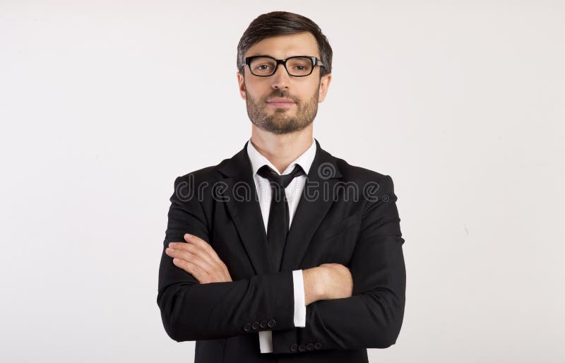 Serious Businessman Standing Crossing Hands On White Background stock images Serious Businessman Standing Crossing Hands On White Background stock images