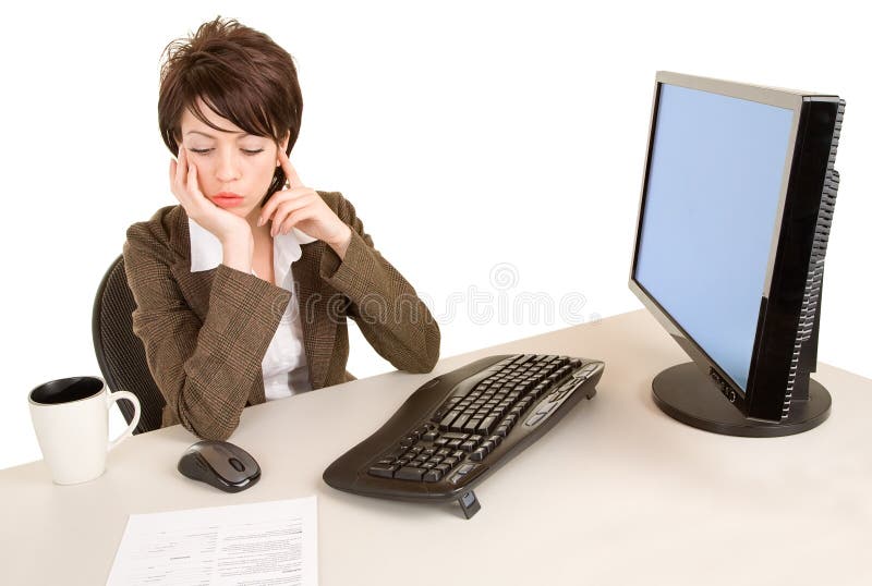 Serious Businesswoman Working at her Desk