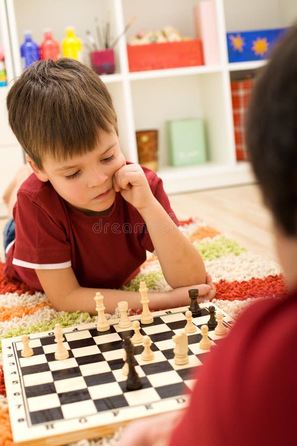 4+ Hundred Chess Player Kid Royalty-Free Images, Stock Photos & Pictures