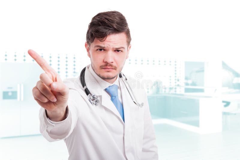 Serious doctor doing refusal gesture