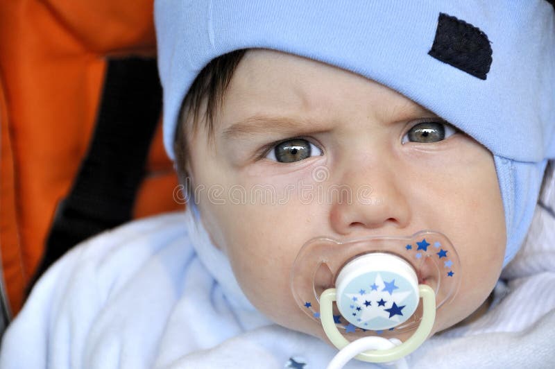 Baby in Bed with Dummy and Silver Toy Stock Photo Image of life