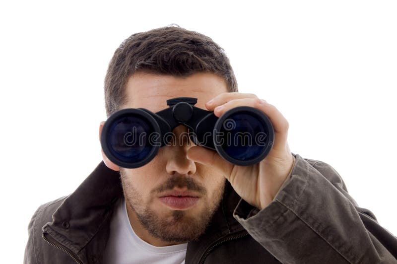 Serious male viewing through binoculars royalty free stock image Serious male viewing through binoculars royalty free stock image