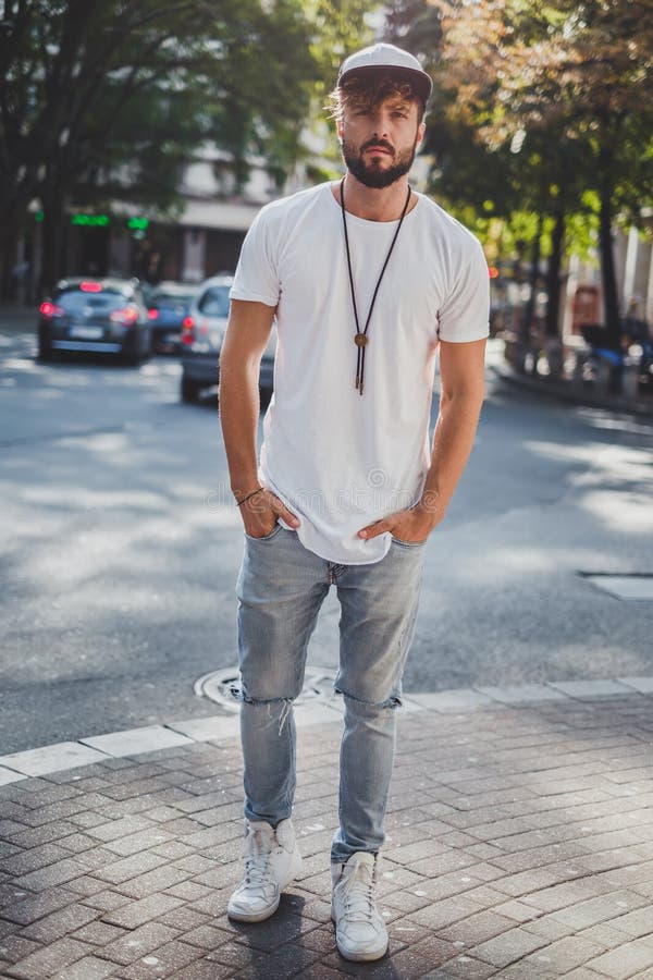 Serious Man Standing on the Sidewalk and Looking Straight Ahead Stock ...