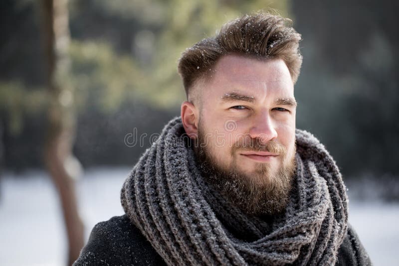 Smiling Man in Winter Jacket Looking at Camera in Forest Stock Photo ...