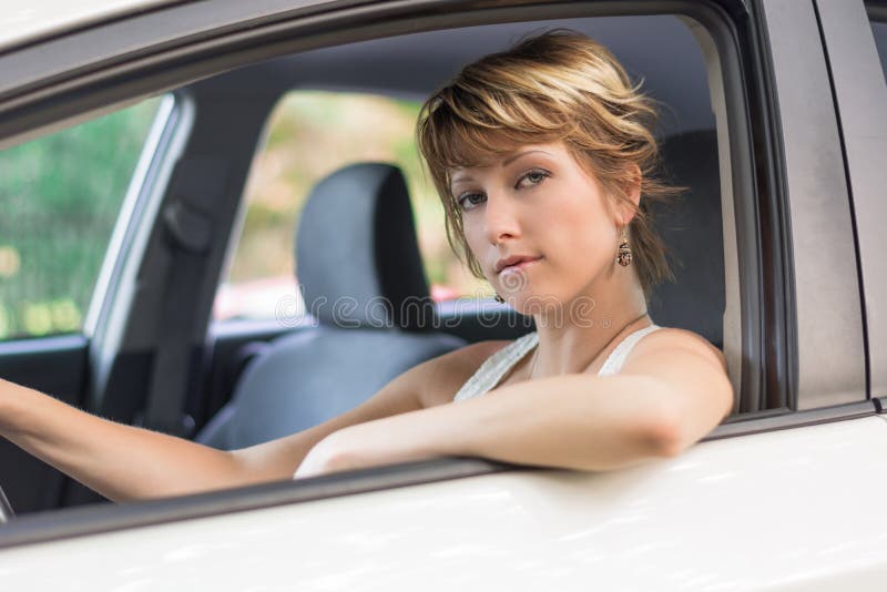 Serious Pretty Blonde Young Woman Driving Car Stock Photo Image Of