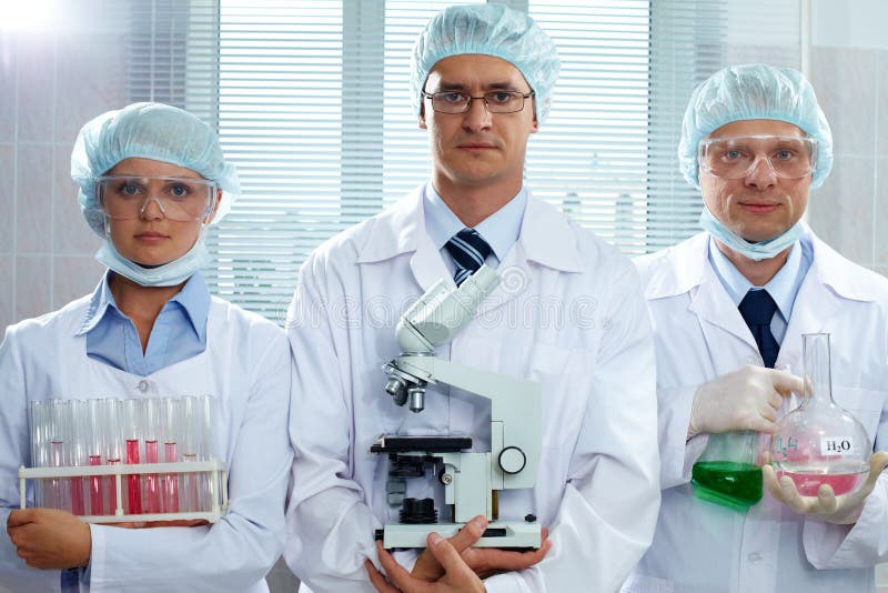 Serious scientists stock image