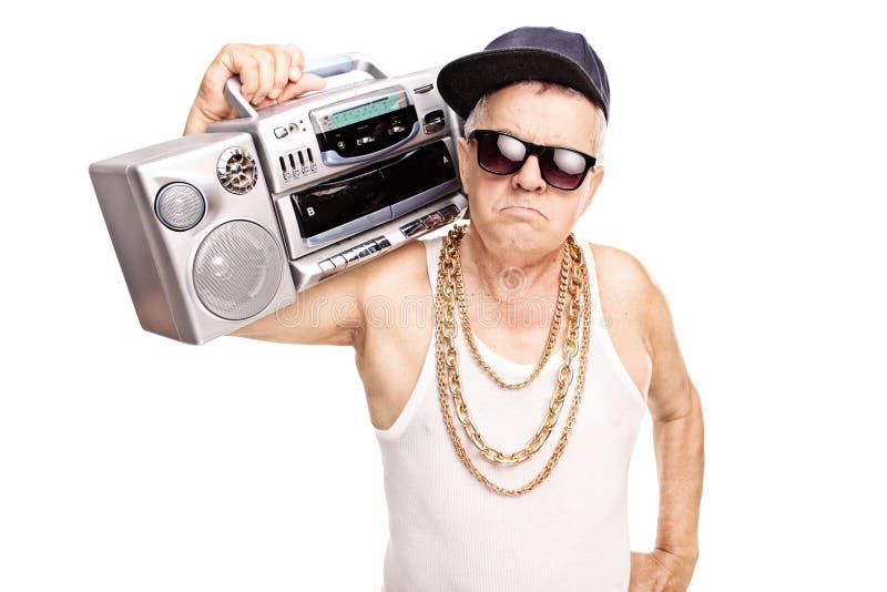 Serious senior rapper holding a ghetto blaster