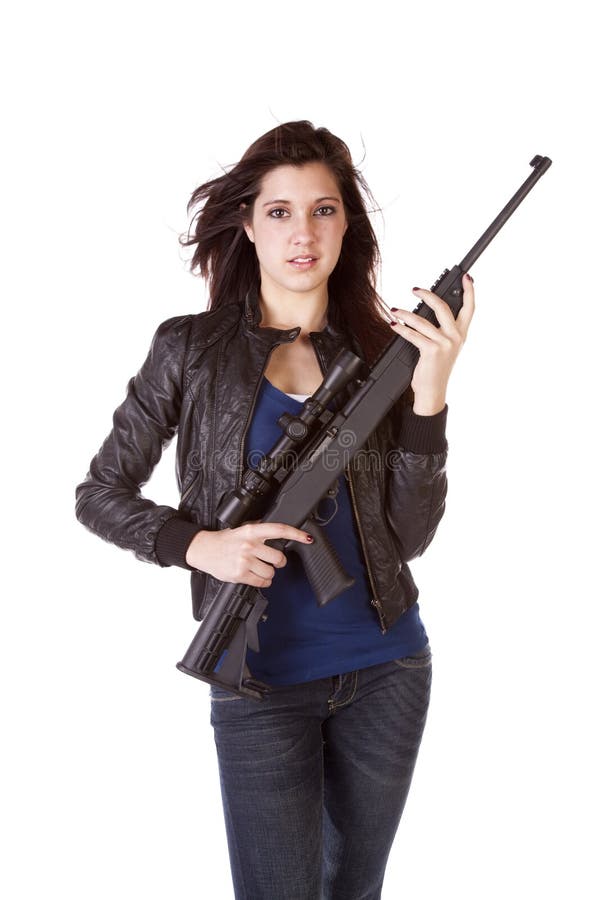 Serious woman holding black gun