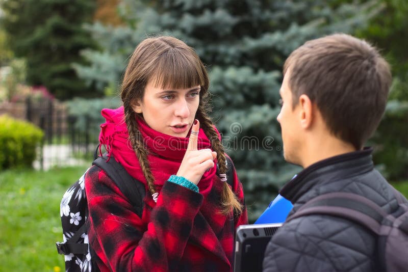 Young student friends talking at college stock image Young student friends talking at college stock image