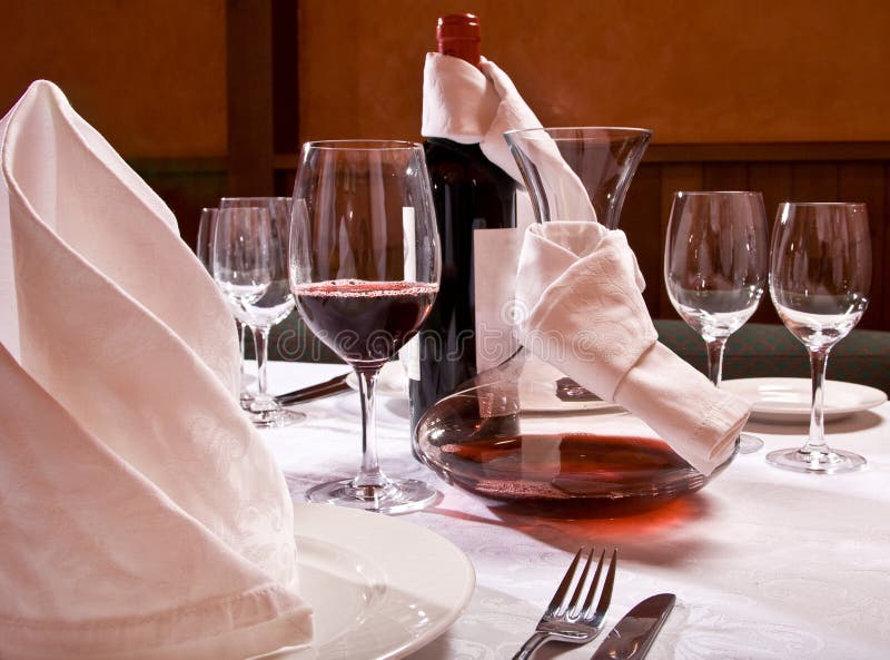 The served table with red wine at restaurant