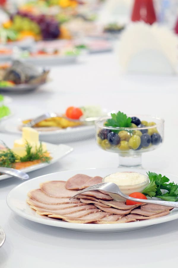 Served table with various dishes stock image