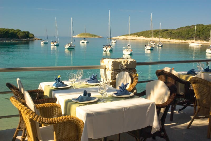 Served tables in beach restaurant stock images Served tables in beach restaurant stock images