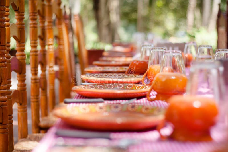 Served traditional mexican table at a beautiful summer day royalty free stock images