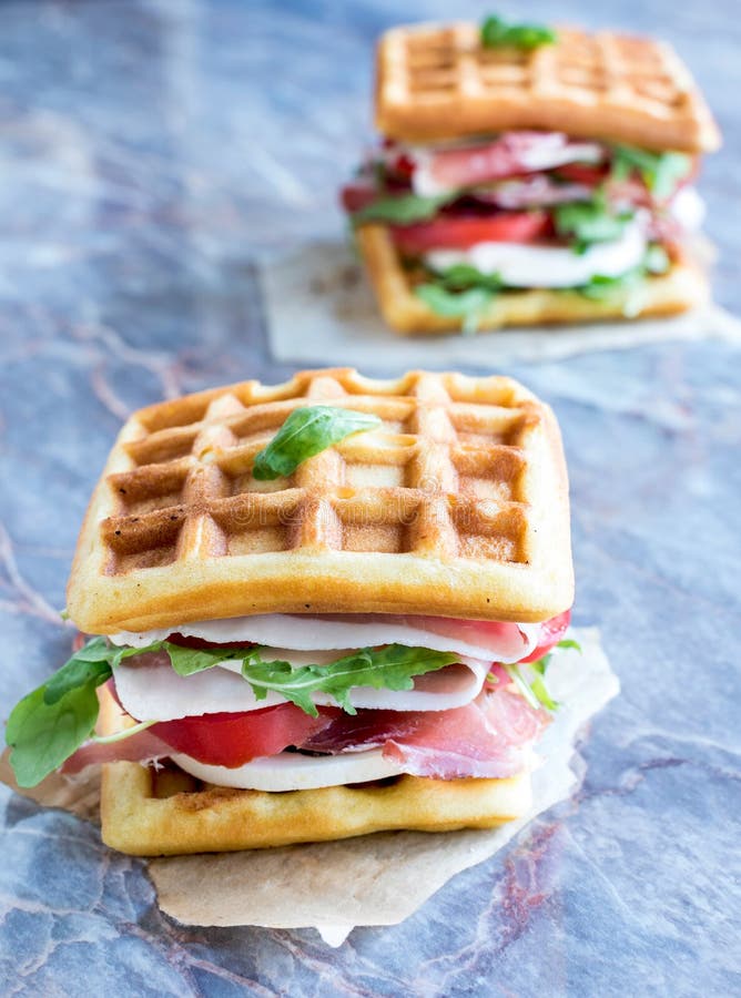 Waffle Sandwiches with Boiled Condensed Milk in Plate on White Wooden ...