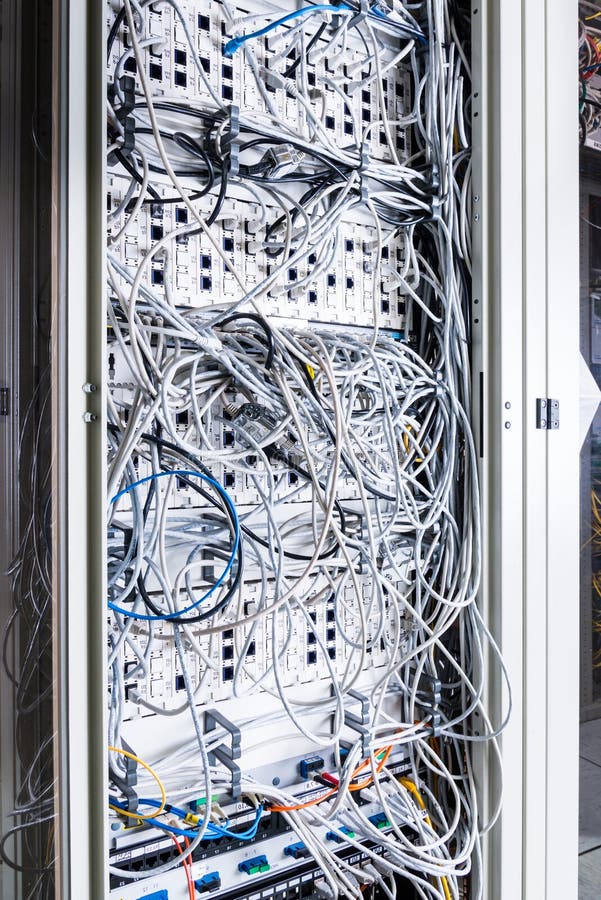 Server rack with switch boards and cables. server inside data center with ethernet cables connected to data switch