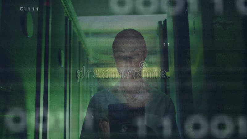 In server room, person working with animation of digital binary code overlay stock footage