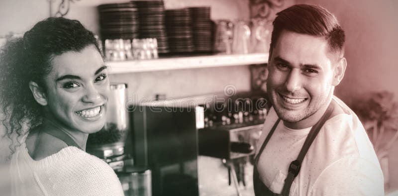 Serveuse et serveur de sourire en café images stock Serveuse et serveur de sourire en café images stock