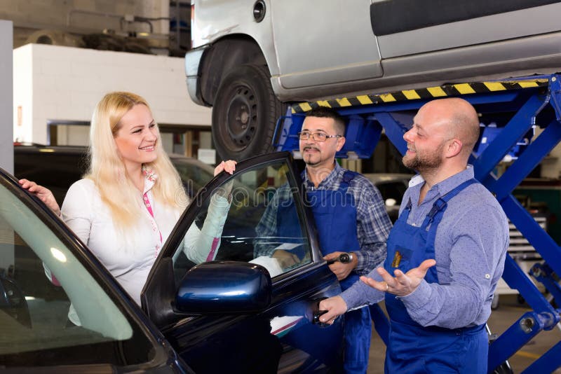 Service Crew and Driver Near Car Stock Photo Image of faces, customer