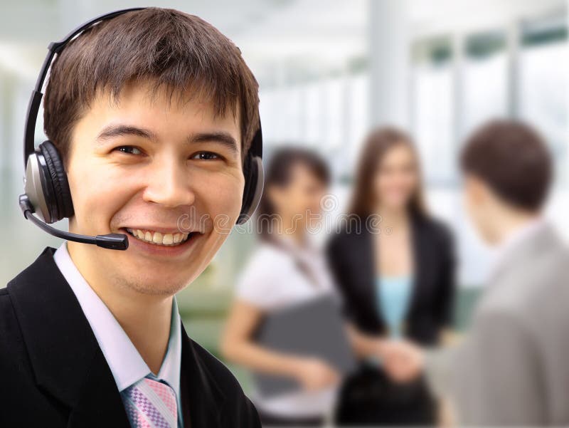 Friendly customer service consultants working. Friendly customer service consultants working