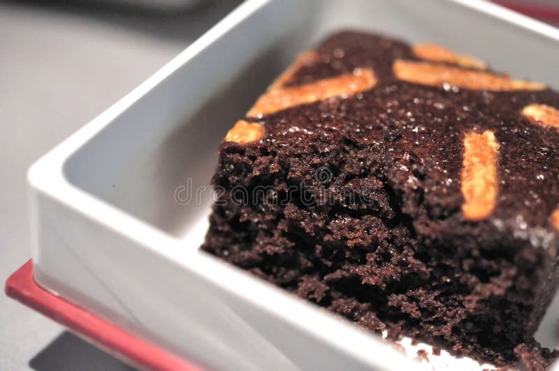 Serving of chocolate cake