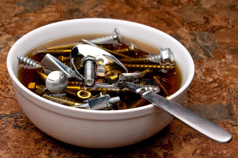A Serving of Nuts and Bolts Stock Photo Image of brown, silverware