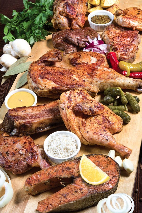 Serving Restaurant Concept. Assorted Delicious Grilled Meat with Vegetable. Mixed Grilled Meat