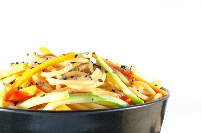 Serving of Spaghetti with Carrots and Zucchini and Soy Sauce Stock