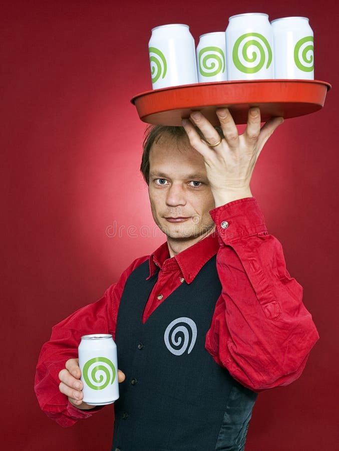 A waiter, with a tray of dreamstime cans above his head offering a canned dreamstime to the customer. A waiter, with a tray of dreamstime cans above his head offering a canned dreamstime to the customer