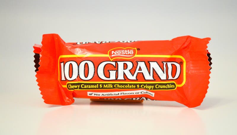 Servings μεγέθους δαγκωμάτων μιας σοκολάτας 100 μεγάλος φραγμός καραμελών στοκ φωτογραφία