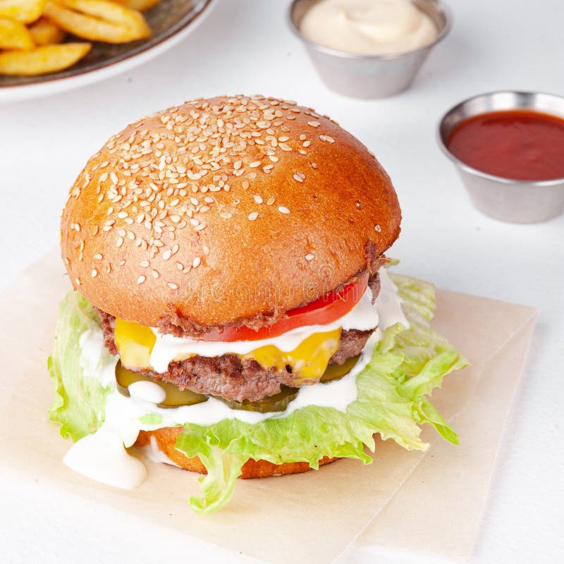 Sesame Hamburger on the Black Background and Wooden Table Stock Image ...