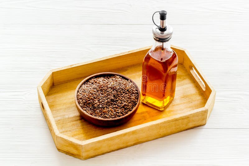 Sesame Oil in Bottle with Ingredient Sesame Seeds Stock Photo Image