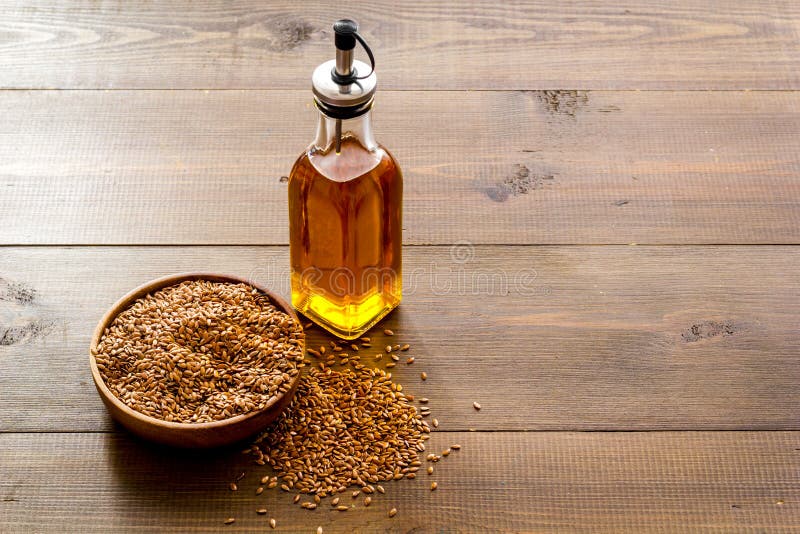 Sesame Oil in Bottle with Ingredient Sesame Seeds Stock Photo Image