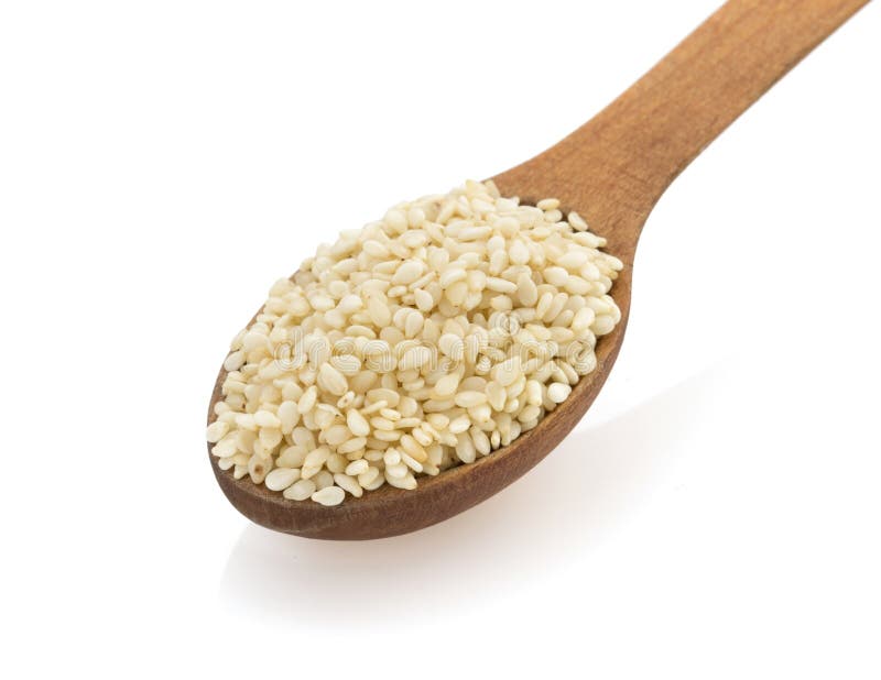 Sesame seed in spon on white