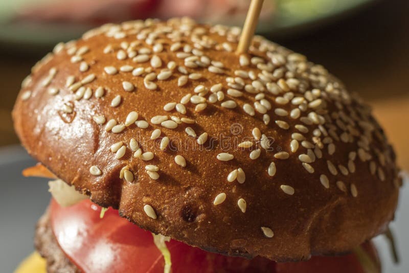 Hamburger On Sesame Buns With Succulent Beef Patties And Fresh Salad