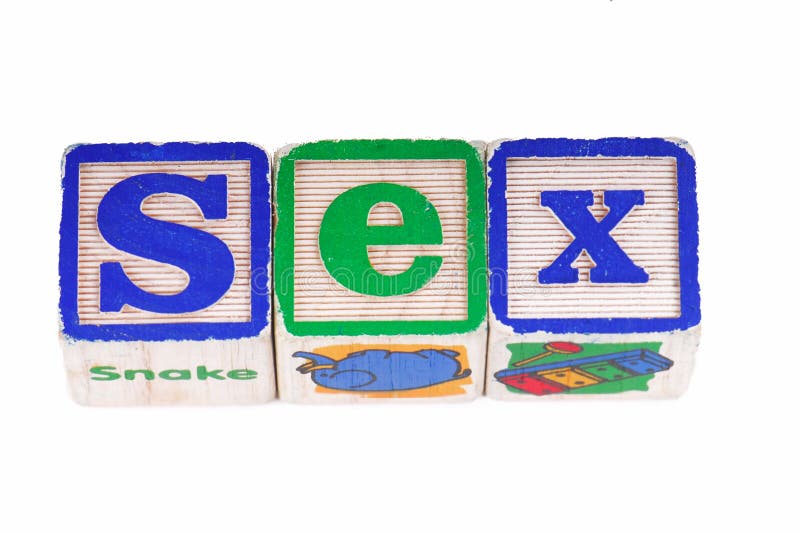 The word sex written in wooden playing blocks. The word sex written in wooden playing blocks