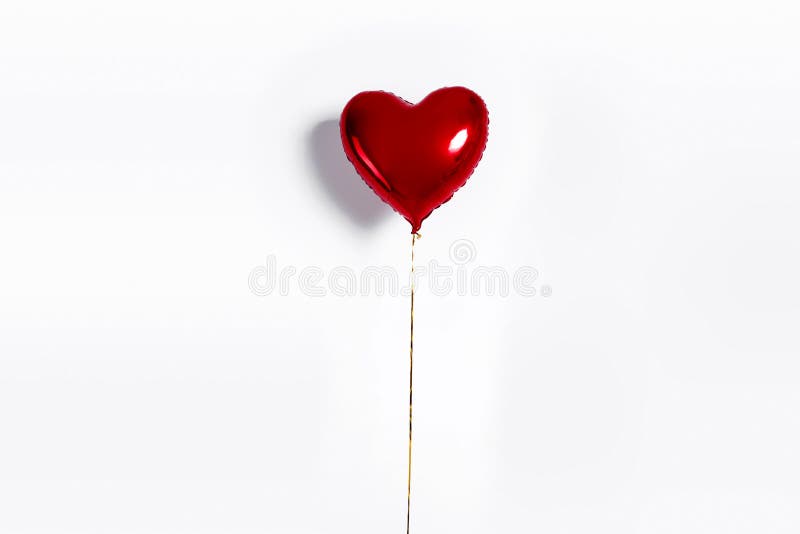 Set of Air Balloons. Bunch of red color heart shaped foil balloons isolated on white background. Love.