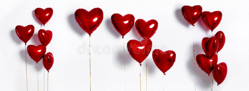 Set of Air Balloons. Bunch of red color heart shaped foil balloons isolated on white background. Love.