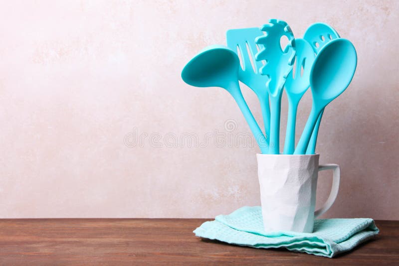 https://thumbs.dreamstime.com/b/set-blue-kitchen-utensils-ceramic-cup-neutral-background-187105305.jpg