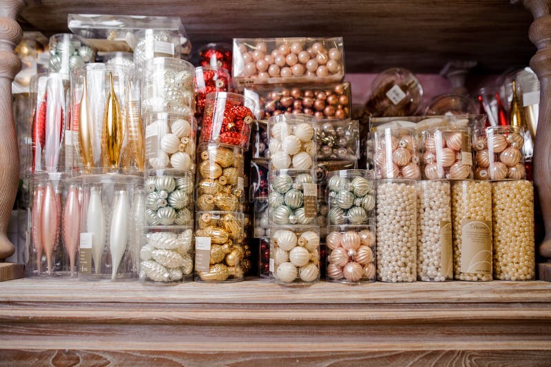 Boxes with beautiful Christmas decoration toys arranged on the shelf stock photos Boxes with beautiful Christmas decoration toys arranged on the shelf stock photos