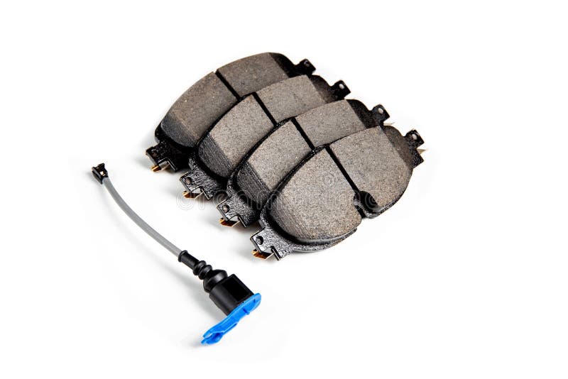 Set of Brake Pads with a Wear Indicator on a White Background, Isolate. Wear Sensor for Brake