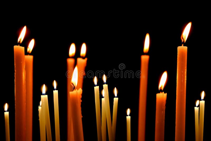 Set of candles in the dark concept of religion