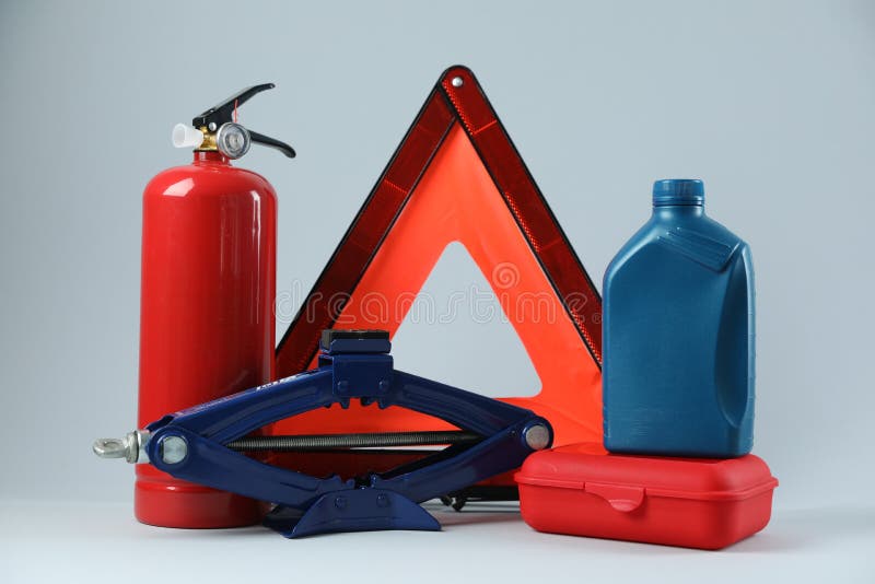Set of Car Safety Equipment on Light Grey Background Stock Photo