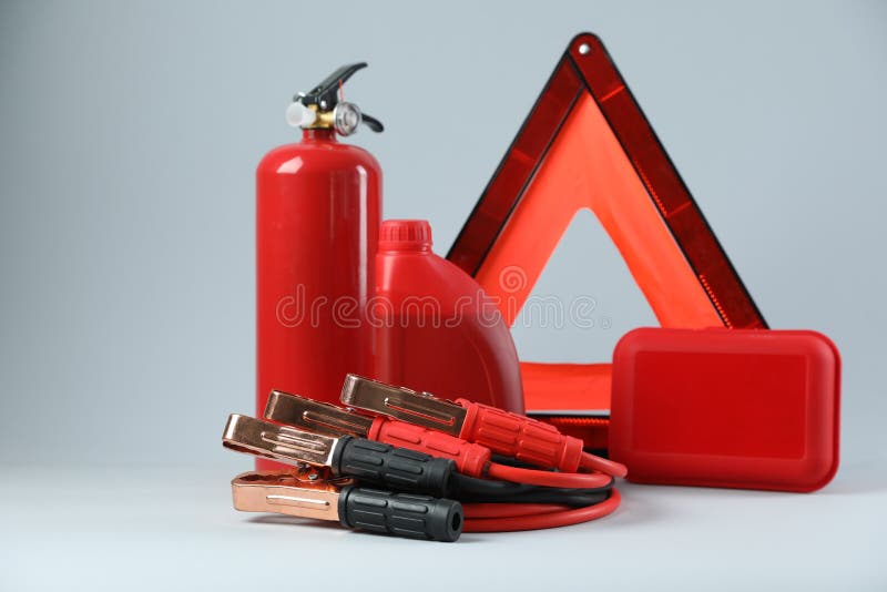 Set of Car Safety Equipment on Light Grey Background Stock Photo