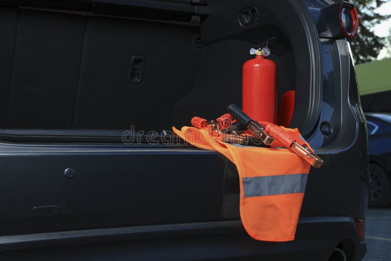 Set of Car Safety Equipment in Trunk, Space for Text Stock Photo